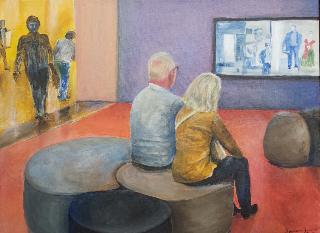 a couple admiring a work in a museum