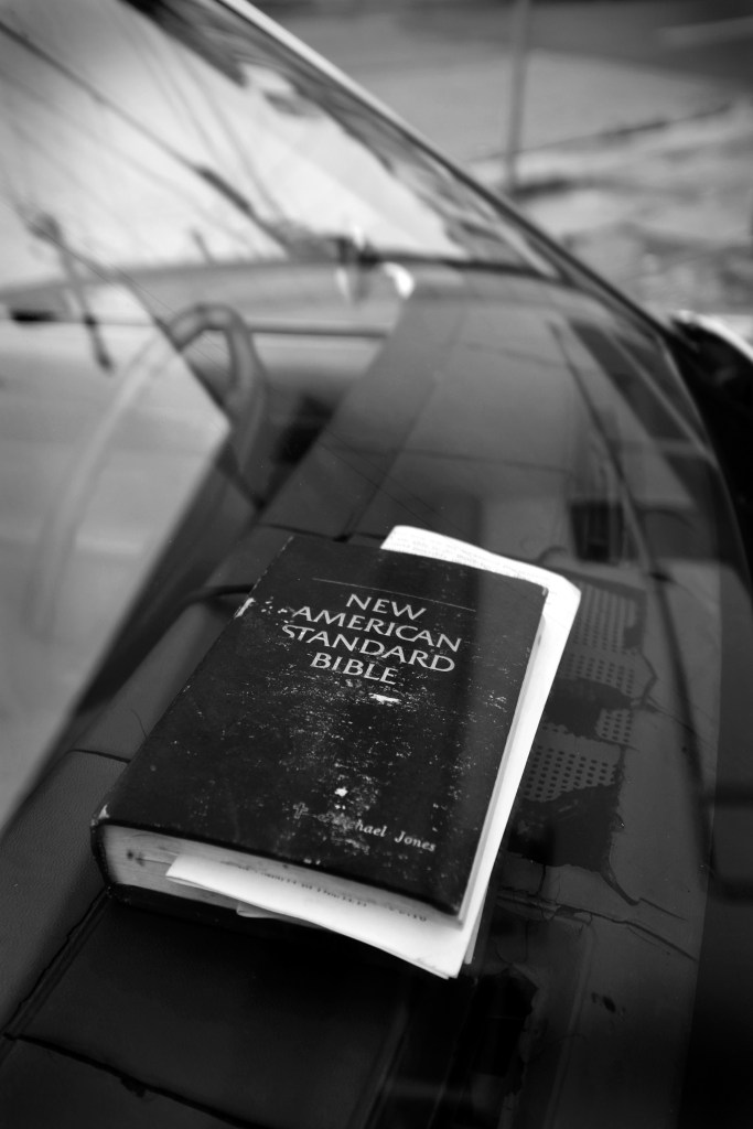 Bible on the dashboard of a '65 Buick